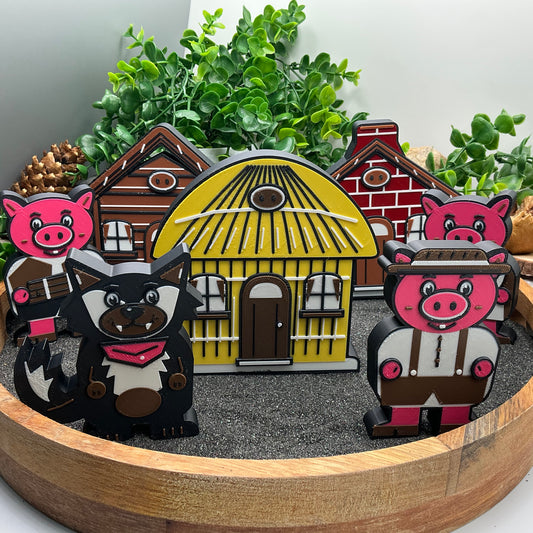 Large Three Little Pigs story set with three houses, three pigs and the wolf standing in a sand tray