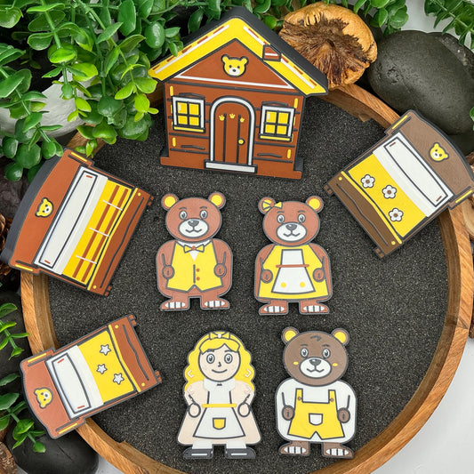 Large Goldilocks and the Three Bears eight-piece set laid flat in a wooden sand tray