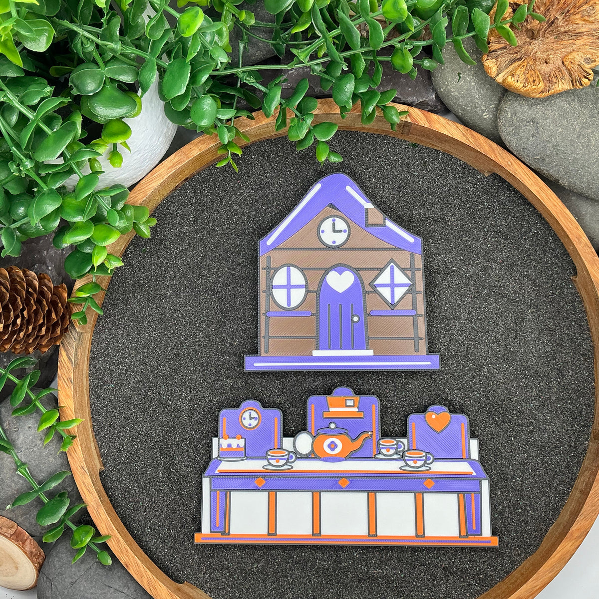 Large purple Wonderland cottage and tea-party scene laid flat in a sand tray