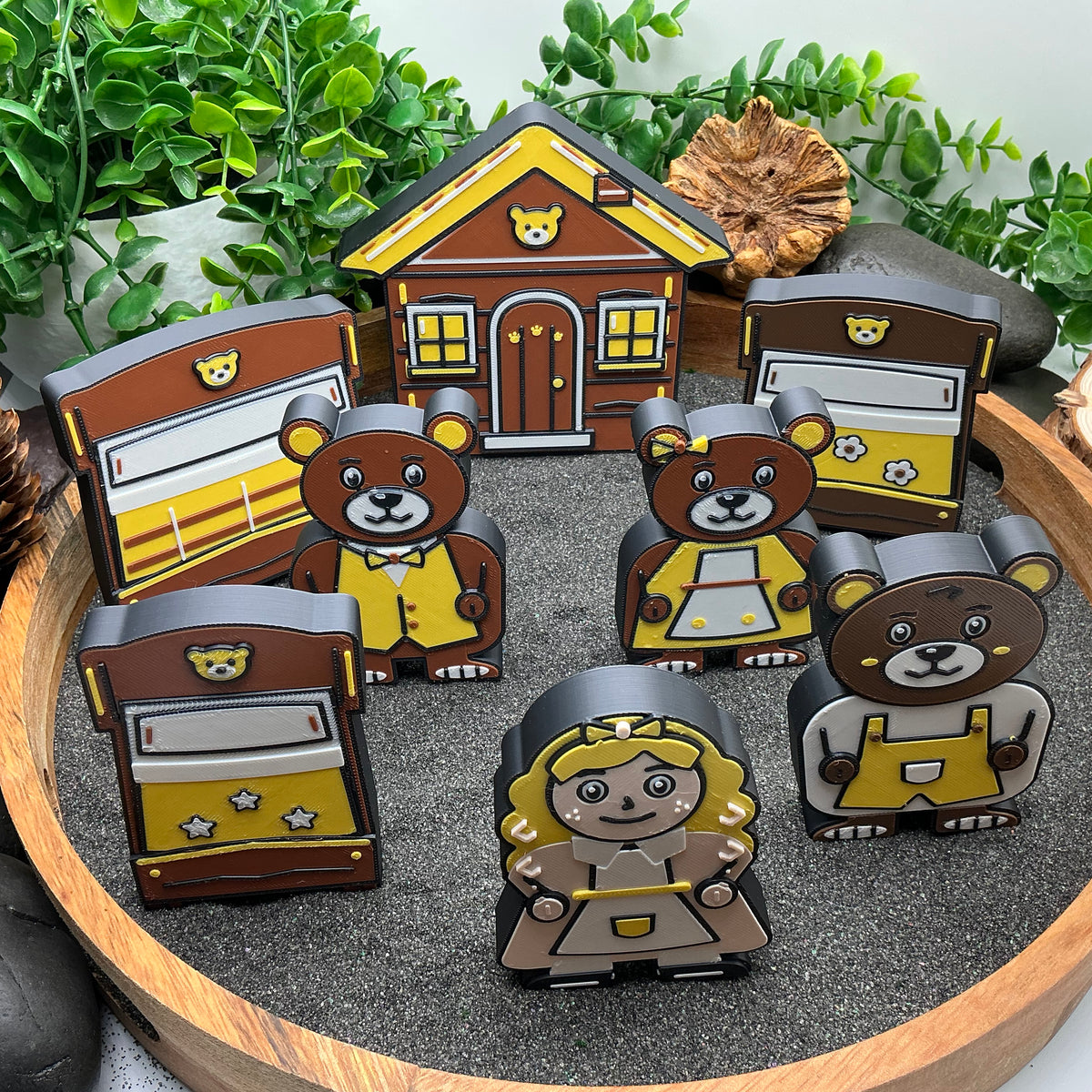Large Goldilocks story scene with three bears, three beds and a cottage, viewed from above
