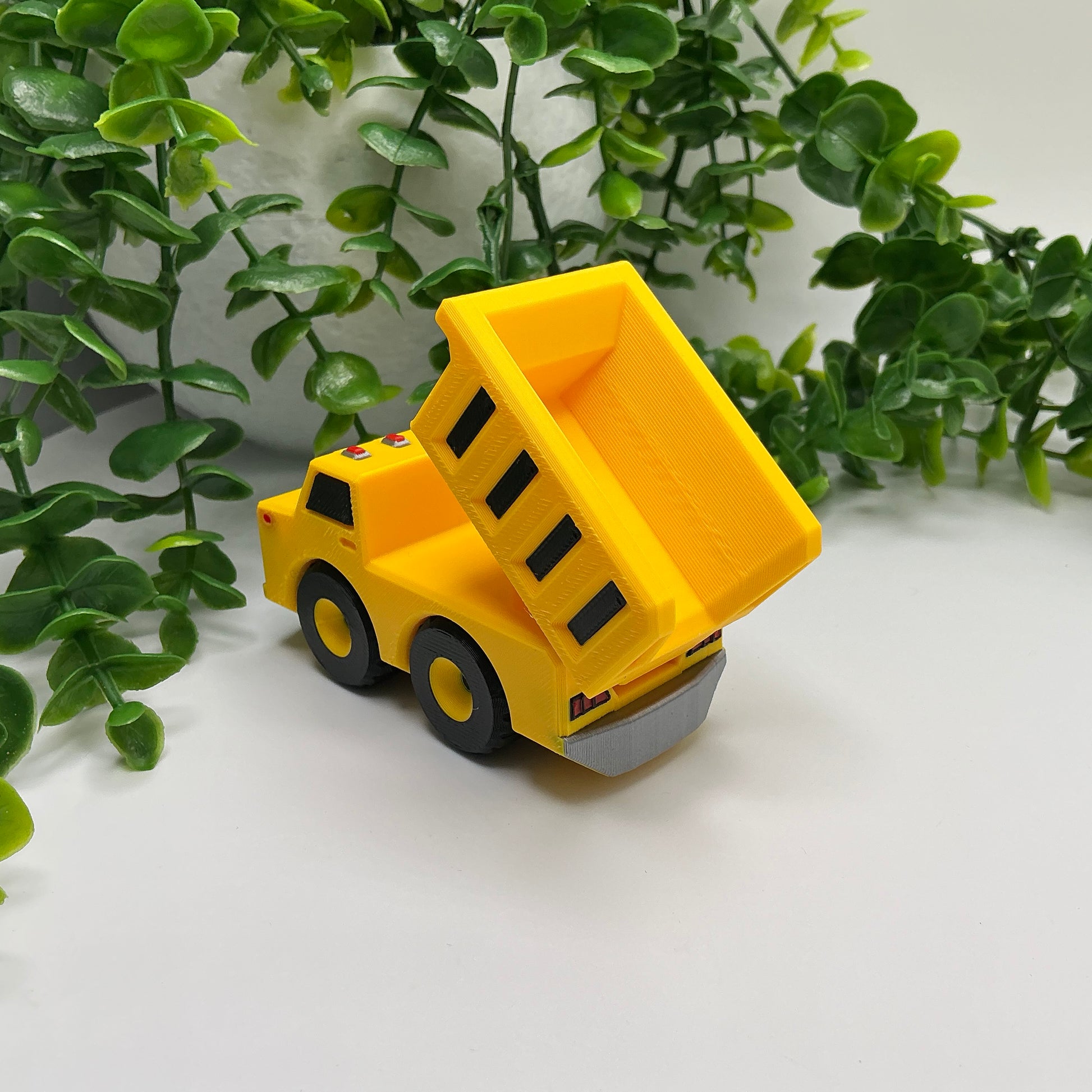 3D-printed multi-coloured dump truck construction vehicle with tipper bed - view 4 of 4