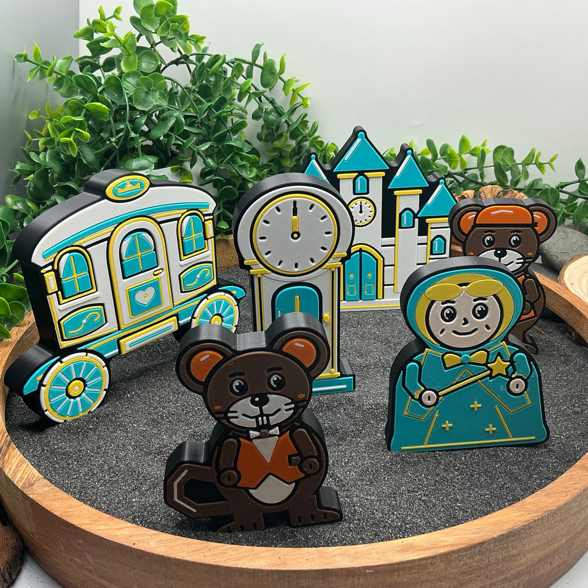 Large Cinderella carriage, grandfather clock and castle standing with the fairy godmother and two mice