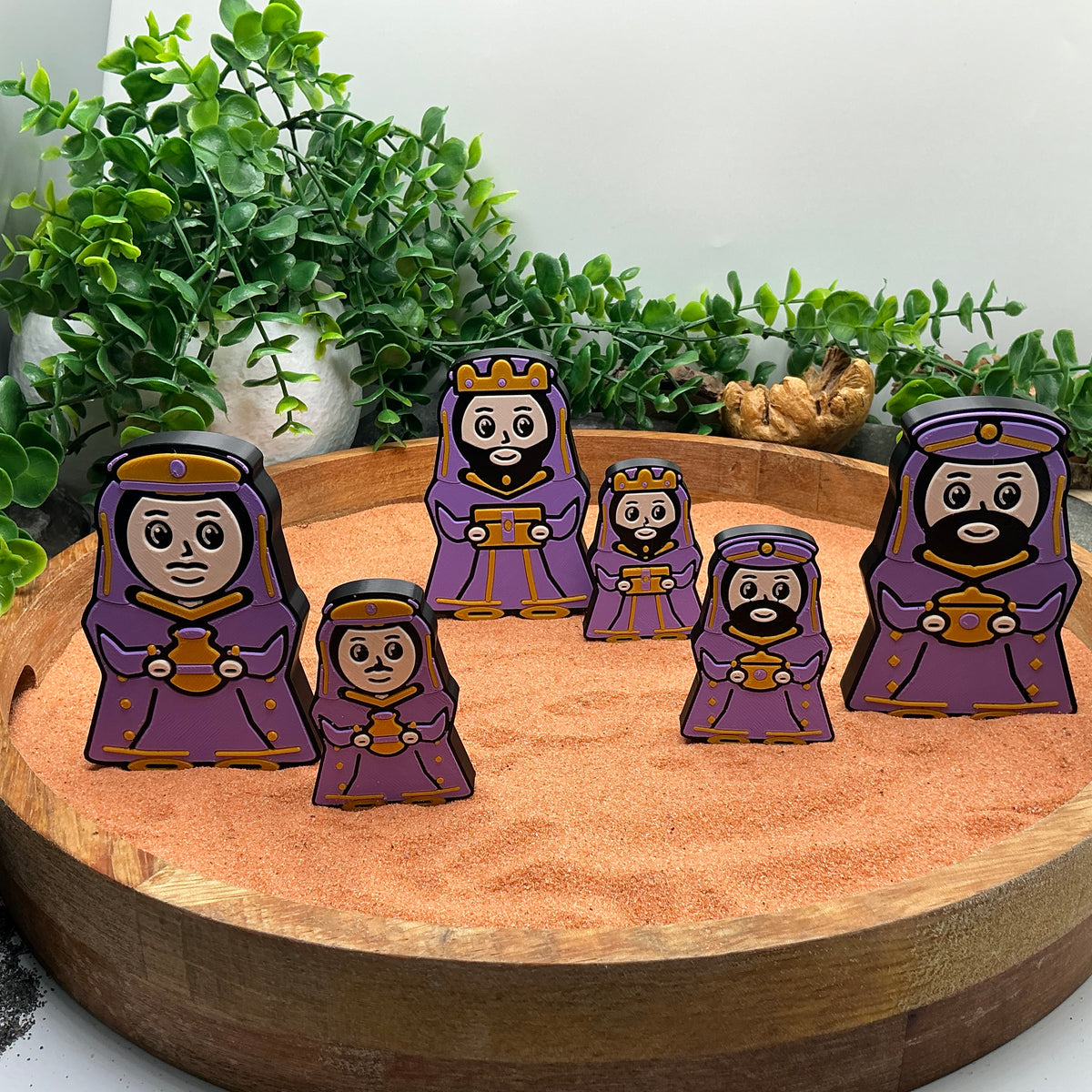Large and Small Nativity wise men standing together, showing the difference in figure sizes