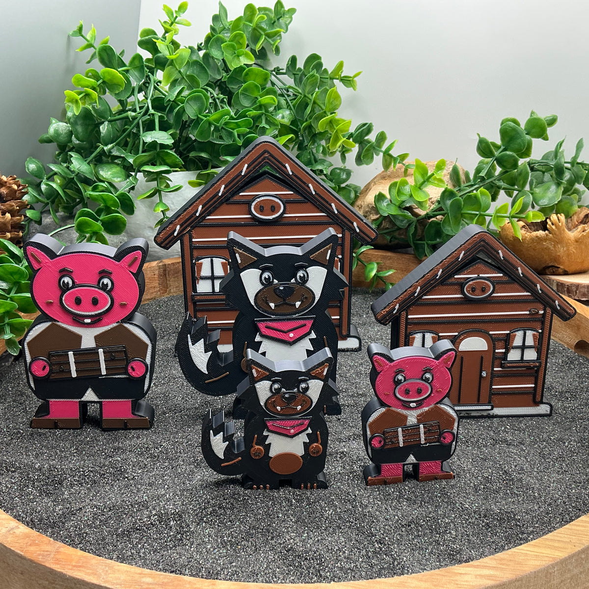 Large and Small pigs and wolves standing in front of brown stick houses