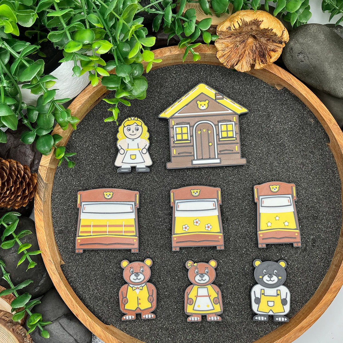 Small Goldilocks and the Three Bears eight-piece set laid out in a wooden sand tray