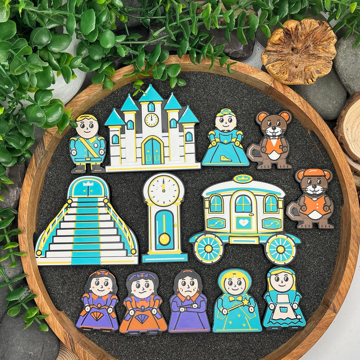 Complete Small 13-piece Cinderella story set laid flat, showing nine character and animal figures and four scenery pieces