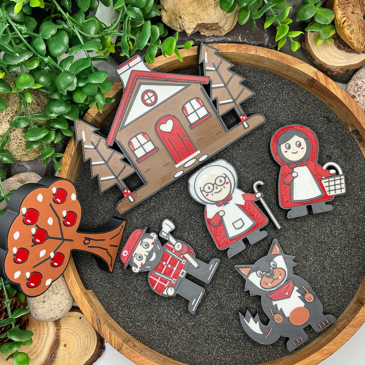 Little Red Riding Hood story set laid flat in a sand tray