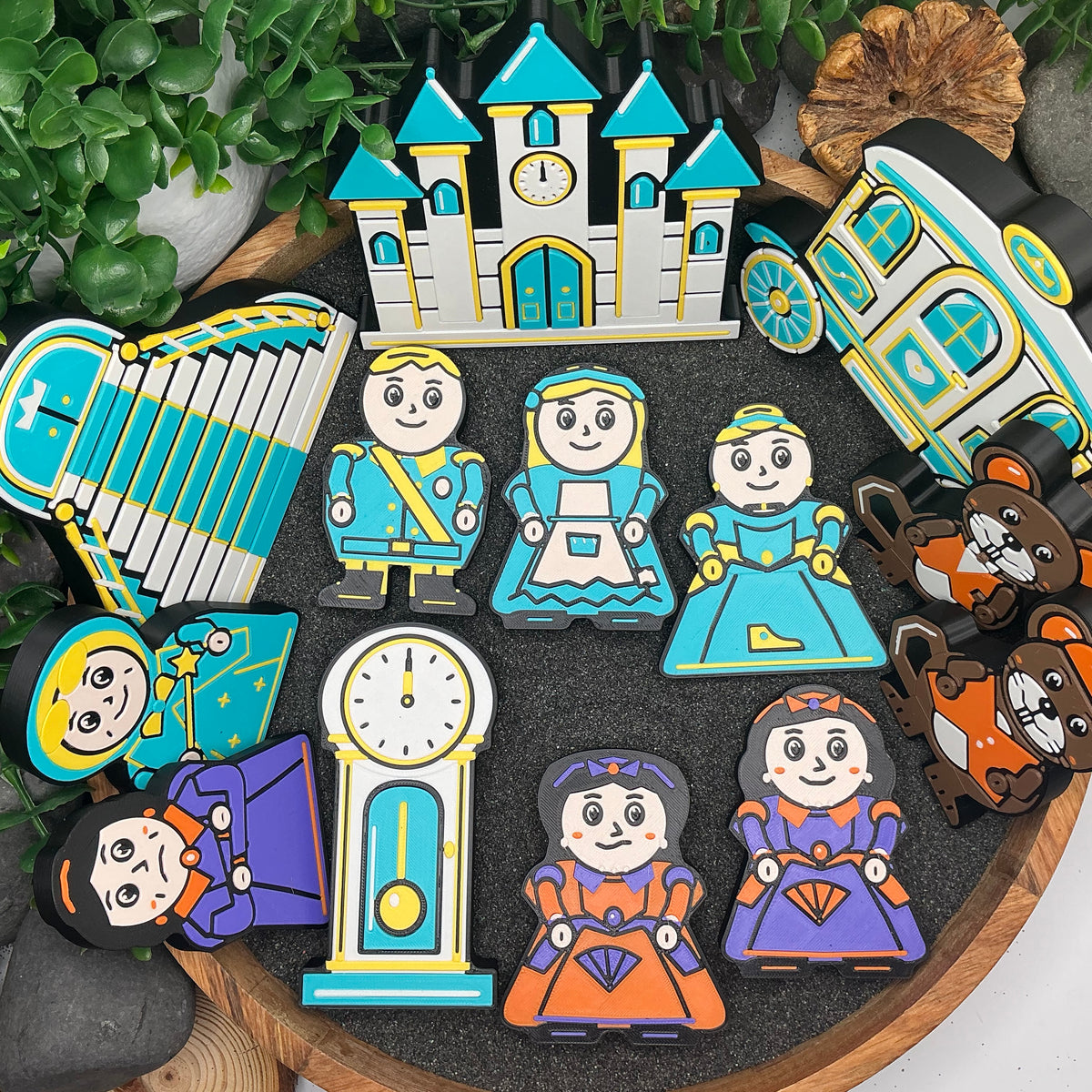 Complete Large 13-piece Cinderella story set laid flat in a wooden tray, with nine character and animal figures, castle, carriage, clock and staircase