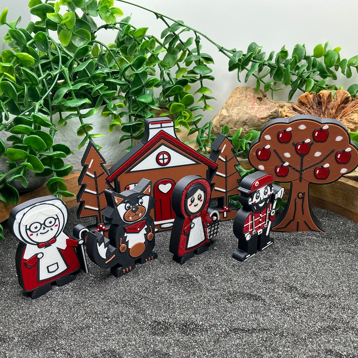 Grandma, wolf, Little Red Riding Hood and woodcutter in a row