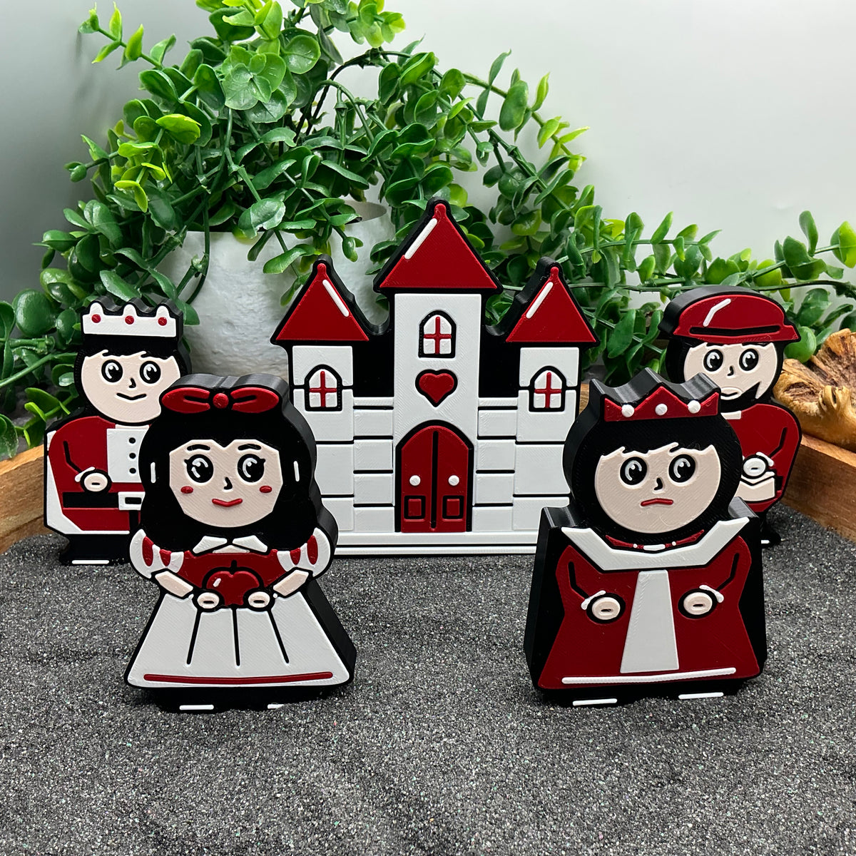 Snow White standing in front of the castle with the queen, prince and huntsman