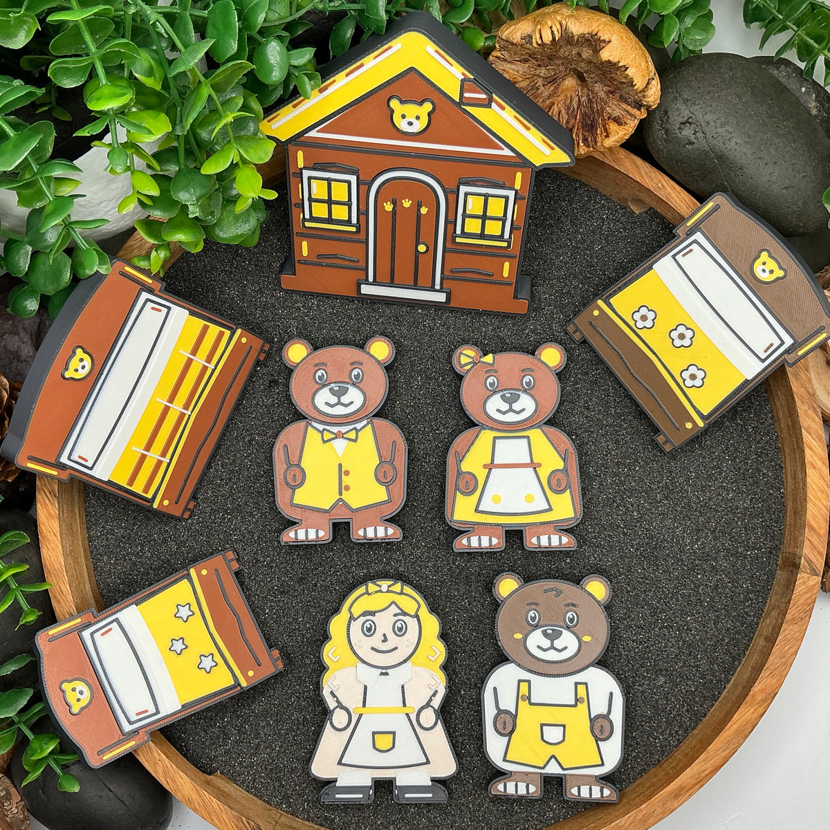 Large Goldilocks and the Three Bears eight-piece set laid flat in a wooden sand tray