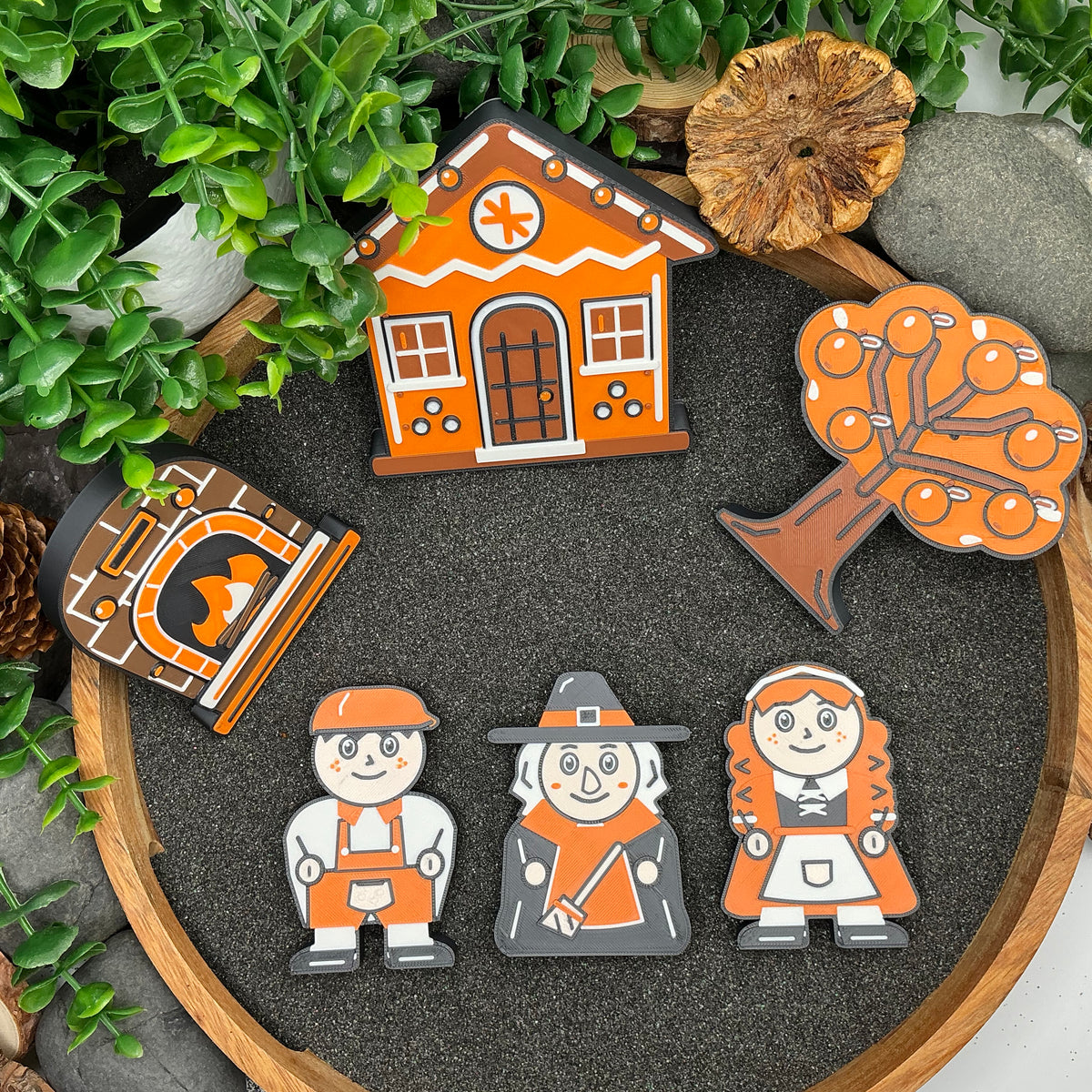 Large Hansel and Gretel six-piece story set laid flat in a sand tray