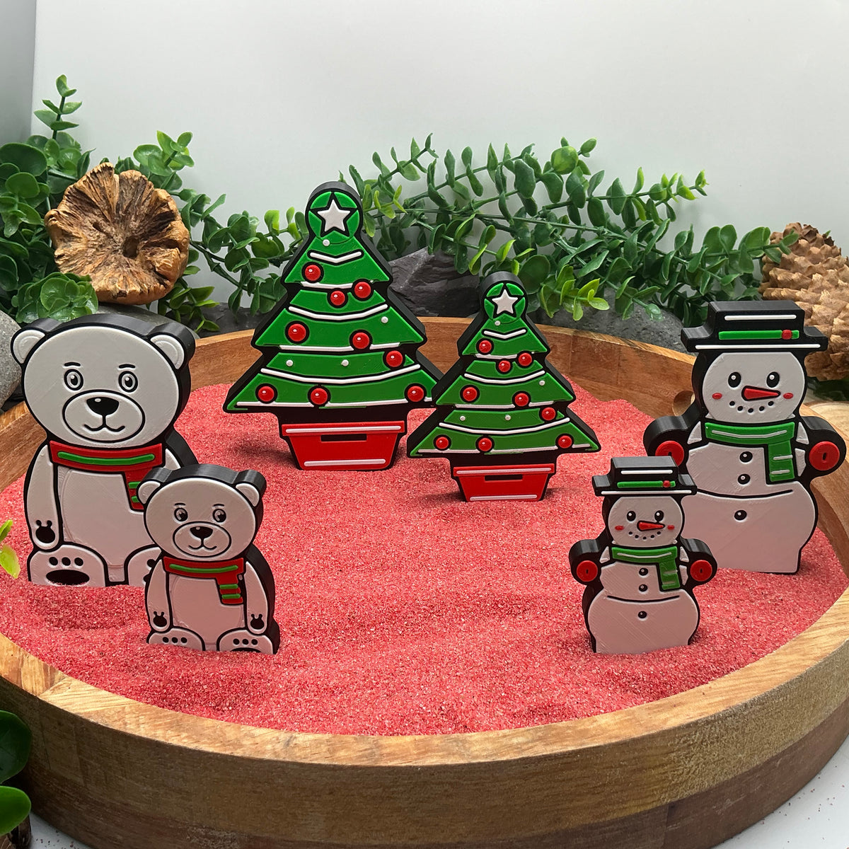 Large and Small Christmas trees, snowmen and polar bears standing together; each purchase supplies one chosen size